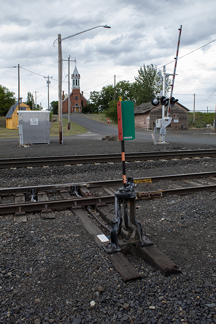 Old Sprague siding switch at B Street with Catholic church in background.